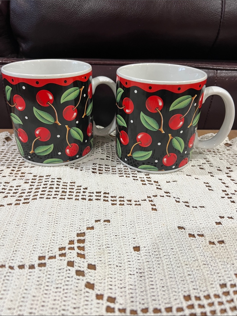 Sakura Stoneware mug”Cherries” by Mary Engelbreit. 12 oz. Set of two.